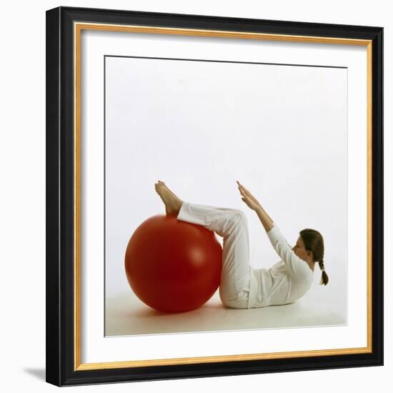 Woman Using An Exercise Ball-Cristina-Framed Premium Photographic Print