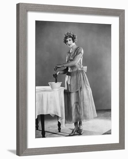 Woman Using Eggbeater-null-Framed Photo