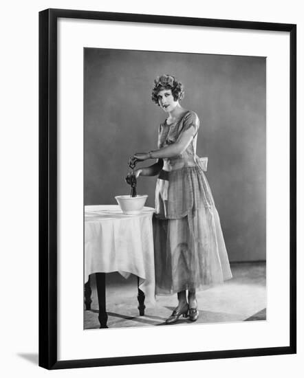 Woman Using Eggbeater-null-Framed Photo