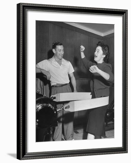 Woman Using Reducing Machine-Ed Clark-Framed Photographic Print