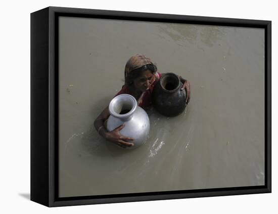 Woman Wades Through Flood Waters to Collect Drinking Water at Kakadhowa Village in India-null-Framed Premier Image Canvas