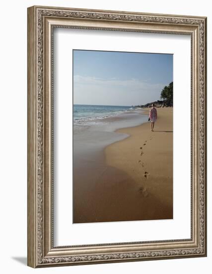 Woman Walking Leaving Footprints on Deserted Beach, Niraamaya, Kovalam, Kerala, India, Asia-James Strachan-Framed Photographic Print