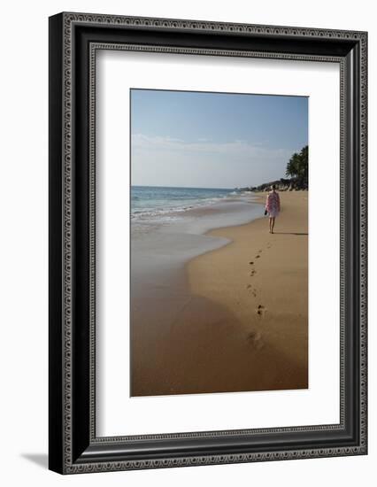 Woman Walking Leaving Footprints on Deserted Beach, Niraamaya, Kovalam, Kerala, India, Asia-James Strachan-Framed Photographic Print