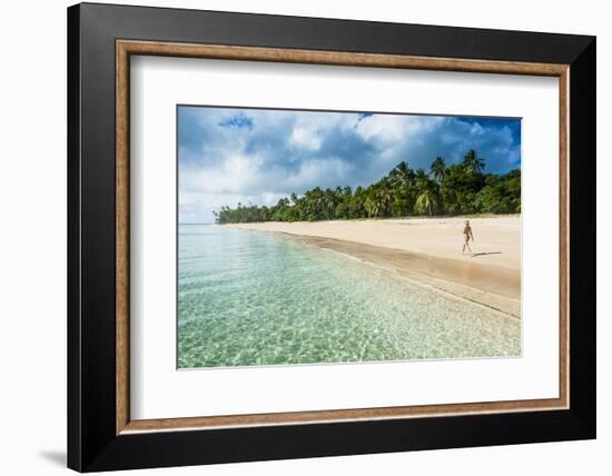 Woman Walking on a Palm Fringed White Sand Beach in Ha'Apai Islands, Tonga, South Pacific-Michael Runkel-Framed Photographic Print