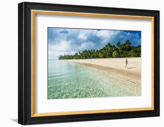 Woman Walking on a Palm Fringed White Sand Beach in Ha'Apai Islands, Tonga, South Pacific-Michael Runkel-Framed Photographic Print