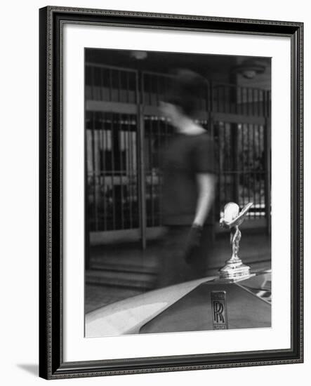 Woman Walking Past a Rolls-Royce-null-Framed Photographic Print