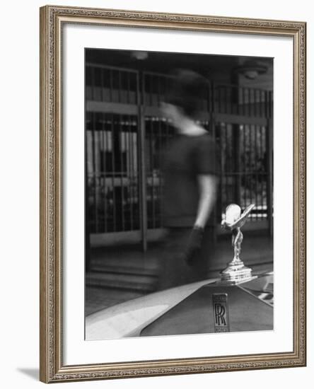 Woman Walking Past a Rolls-Royce-null-Framed Photographic Print