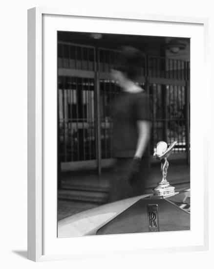 Woman Walking Past a Rolls-Royce-null-Framed Photographic Print