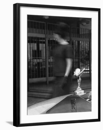 Woman Walking Past a Rolls-Royce-null-Framed Photographic Print