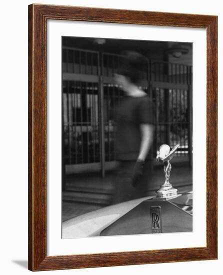 Woman Walking Past a Rolls-Royce-null-Framed Photographic Print