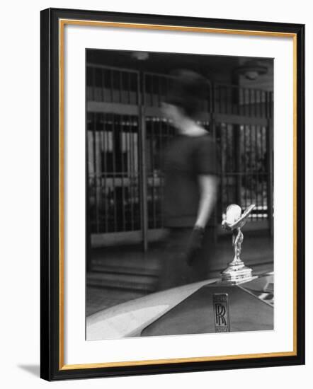 Woman Walking Past a Rolls-Royce-null-Framed Photographic Print