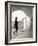 Woman walking up staircase holding handrail-John Edward Linden-Framed Photo