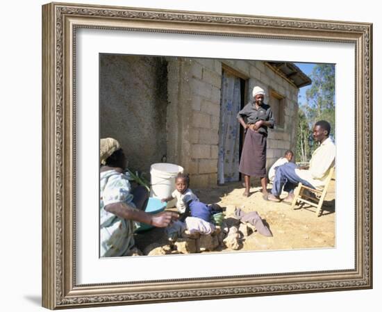 Woman Washing Clothes Outside Shack, Godet, Haiti, Island of Hispaniola-Lousie Murray-Framed Photographic Print