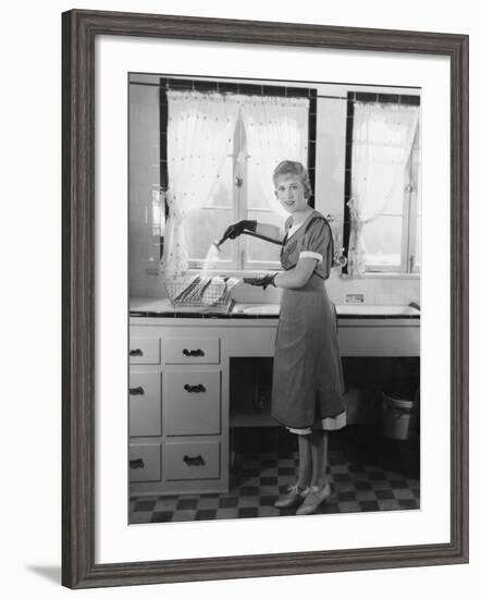 Woman Washing Dishes-null-Framed Photo