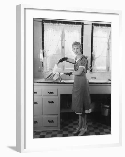 Woman Washing Dishes-null-Framed Photo