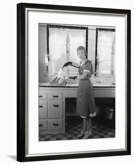 Woman Washing Dishes-null-Framed Photo