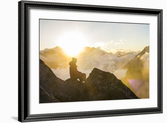 Woman Watches The Sunrise On Top Of A Mountain In North Cascade National Park In Washington-Hannah Dewey-Framed Photographic Print