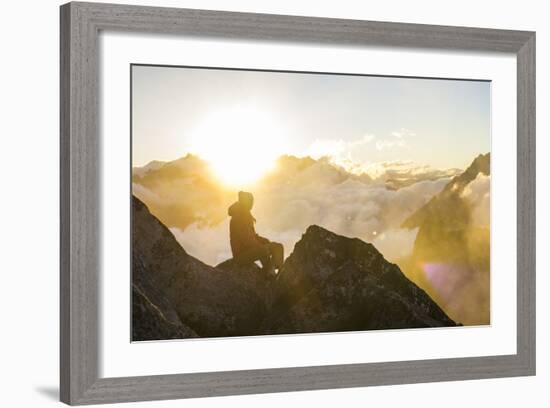 Woman Watches The Sunrise On Top Of A Mountain In North Cascade National Park In Washington-Hannah Dewey-Framed Photographic Print