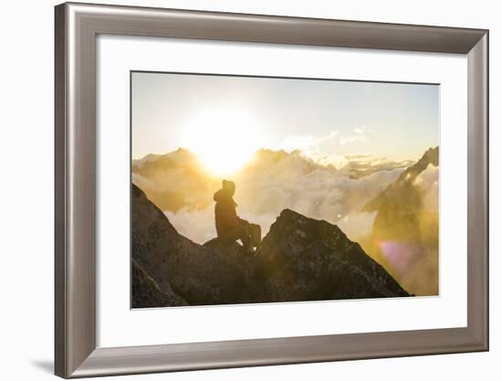 Woman Watches The Sunrise On Top Of A Mountain In North Cascade National Park In Washington-Hannah Dewey-Framed Photographic Print