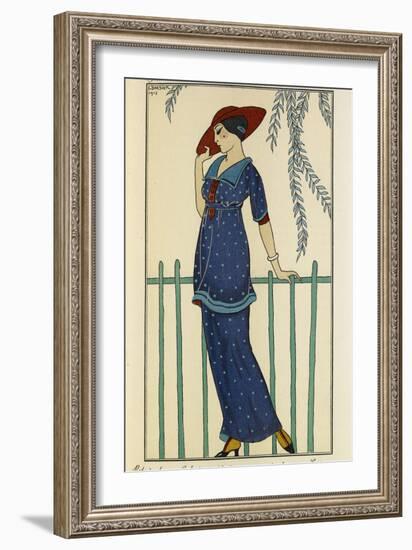 Woman wearing a beach dress and a raw silk scarf and a red hat-Georges Barbier-Framed Giclee Print