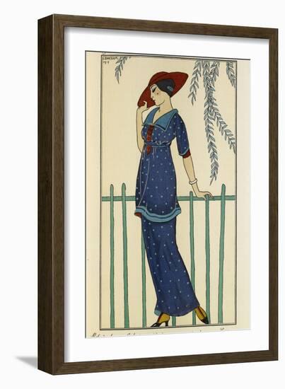 Woman wearing a beach dress and a raw silk scarf and a red hat-Georges Barbier-Framed Giclee Print