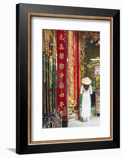 Woman Wearing Ao Dai Dress at Phuoc an Hoi Quan Pagoda, Cholon, Ho Chi Minh City, Vietnam-Ian Trower-Framed Photographic Print