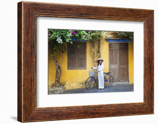 Woman Wearing Ao Dai Dress with Bicycle, Hoi An, Quang Ham, Vietnam-Ian Trower-Framed Photographic Print