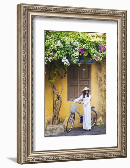 Woman Wearing Ao Dai Dress with Bicycle, Hoi An, Quang Ham, Vietnam-Ian Trower-Framed Photographic Print