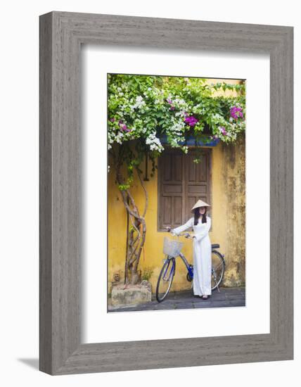 Woman Wearing Ao Dai Dress with Bicycle, Hoi An, Quang Ham, Vietnam-Ian Trower-Framed Photographic Print