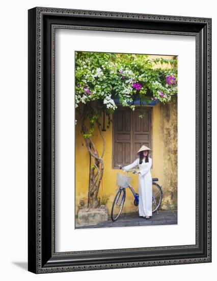 Woman Wearing Ao Dai Dress with Bicycle, Hoi An, Quang Ham, Vietnam-Ian Trower-Framed Photographic Print