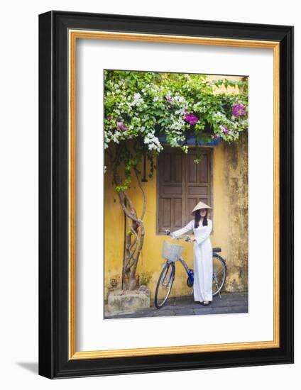 Woman Wearing Ao Dai Dress with Bicycle, Hoi An, Quang Ham, Vietnam-Ian Trower-Framed Photographic Print