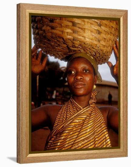 Woman Wearing Gold Fabric Dress and Carrying Basket, Kabile, Brong-Ahafo Region, Ghana-Alison Jones-Framed Premier Image Canvas