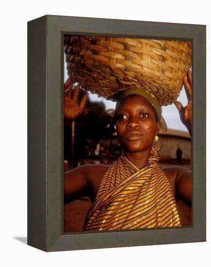 Woman Wearing Gold Fabric Dress and Carrying Basket, Kabile, Brong-Ahafo Region, Ghana-Alison Jones-Framed Premier Image Canvas