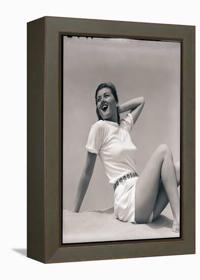 Woman Wearing White Outfit-Bettmann-Framed Premier Image Canvas