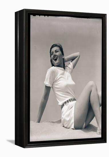 Woman Wearing White Outfit-Bettmann-Framed Premier Image Canvas