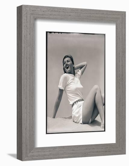 Woman Wearing White Outfit-Bettmann-Framed Photographic Print