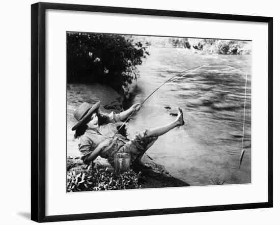 Woman Who Caught a Small Fish Falling over Backwards-null-Framed Photo