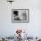 Woman Who Caught a Small Fish Falling over Backwards-null-Framed Photo displayed on a wall
