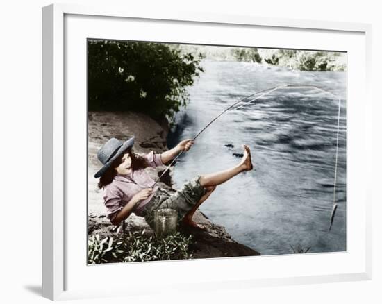 Woman Who Caught a Small Fish Falling over Backwards-null-Framed Photo