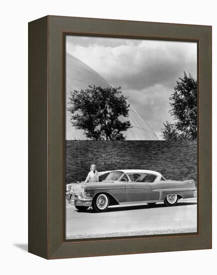 Woman with a 1957 Cadillac Coupe De Ville-null-Framed Premier Image Canvas