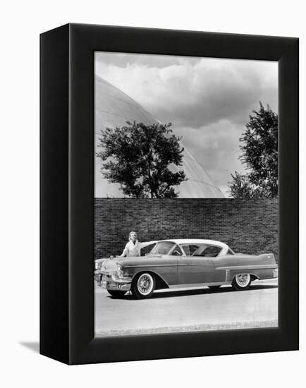 Woman with a 1957 Cadillac Coupe De Ville-null-Framed Premier Image Canvas