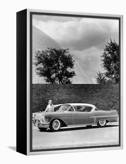 Woman with a 1957 Cadillac Coupe De Ville-null-Framed Premier Image Canvas