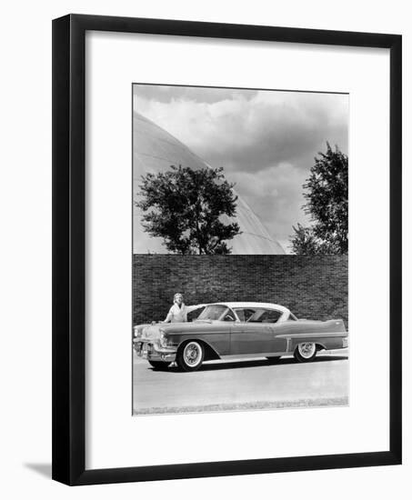 Woman with a 1957 Cadillac Coupe De Ville-null-Framed Photographic Print