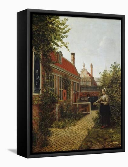 Woman with a Basket of Beans in a Kitchen Garden. Ca. 1660-Pieter de Hooch-Framed Premier Image Canvas