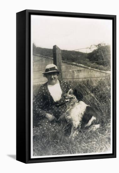 Woman with a Dog in a Field-null-Framed Premier Image Canvas