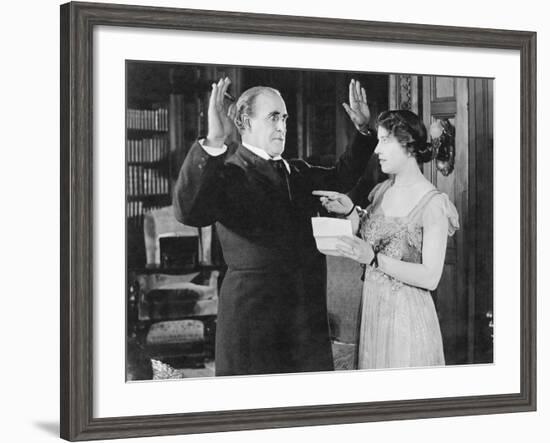 Woman with a Letter in Her Hand Pointing at a Man-null-Framed Photo