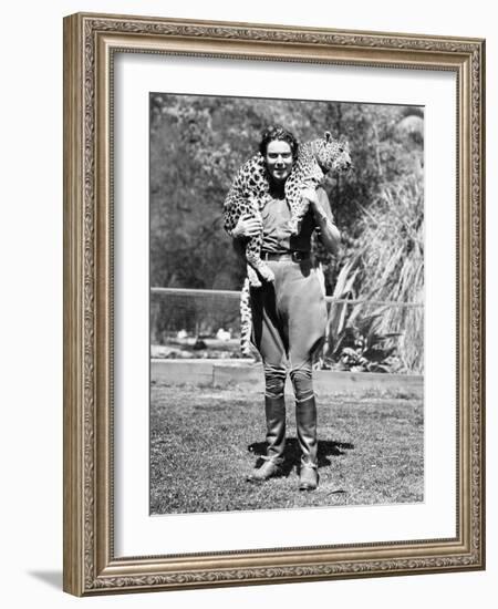 Woman with a Live Leopard around Her Neck-null-Framed Photo