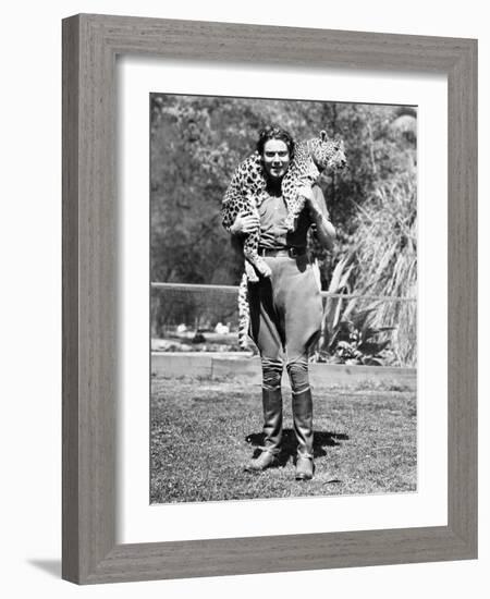 Woman with a Live Leopard around Her Neck-null-Framed Photo