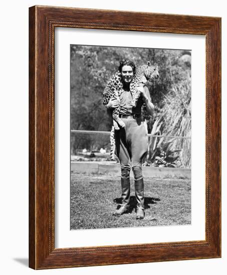 Woman with a Live Leopard around Her Neck-null-Framed Photo