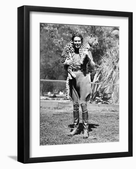 Woman with a Live Leopard around Her Neck-null-Framed Photo